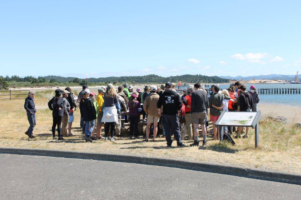 Fracked gas resistors get ready for a day of field-checking on land and on sea during group orientation.